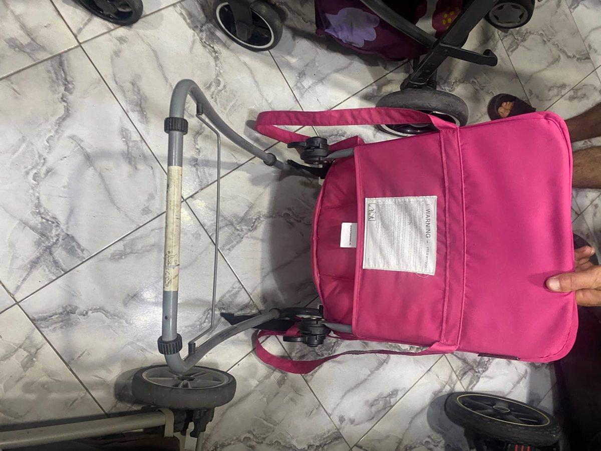 Poussette bébé rose, pliable avec poignée réglable